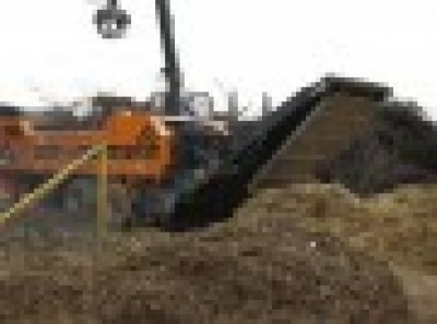 Proceso de trituraci�n de madera usada